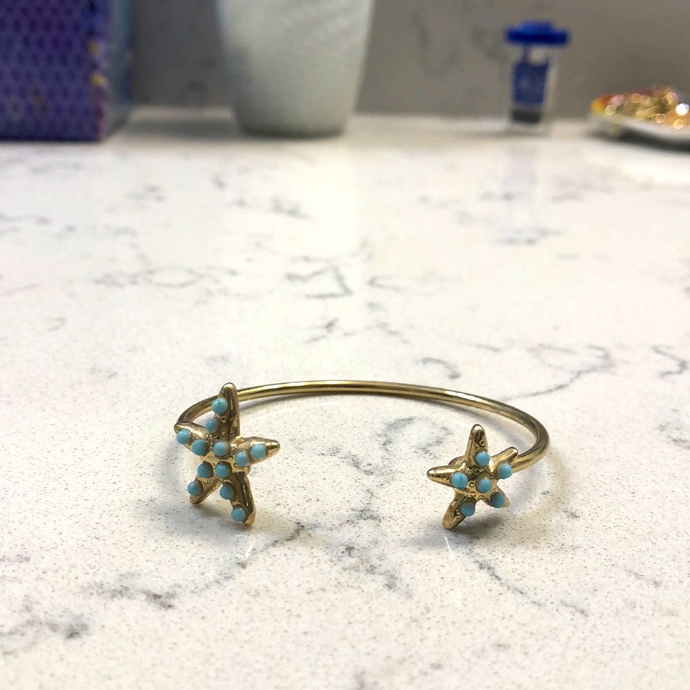 Gold starfish bangle with turquoise details